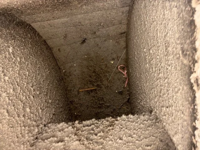 Return duct line before air duct cleaning, debris and settled dust visible, Birmingham metro home