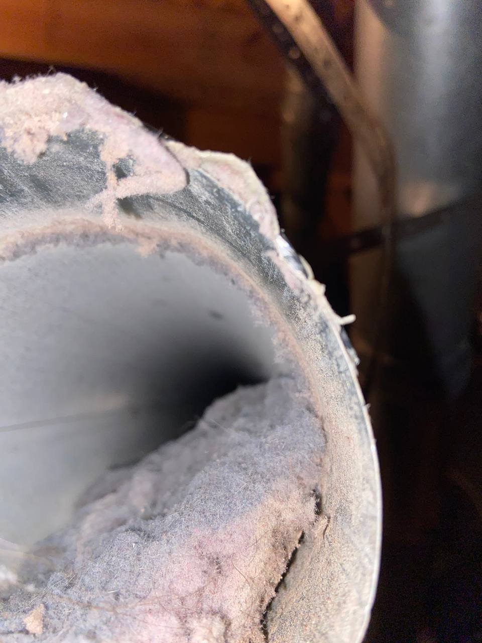 Return duct with collapsed insulation before cleaning, Birmingham metro