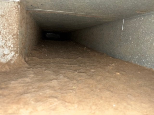 Air duct trunk line before cleaning, Adamsville, AL