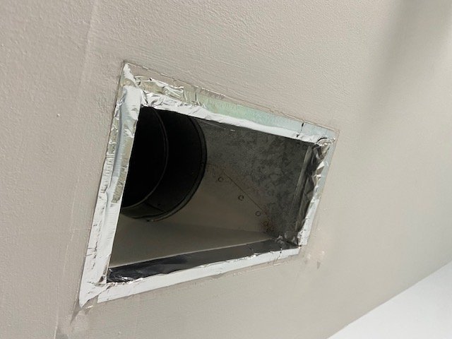 Same ceiling register after gaps sealed with foil tape, Hoover, AL